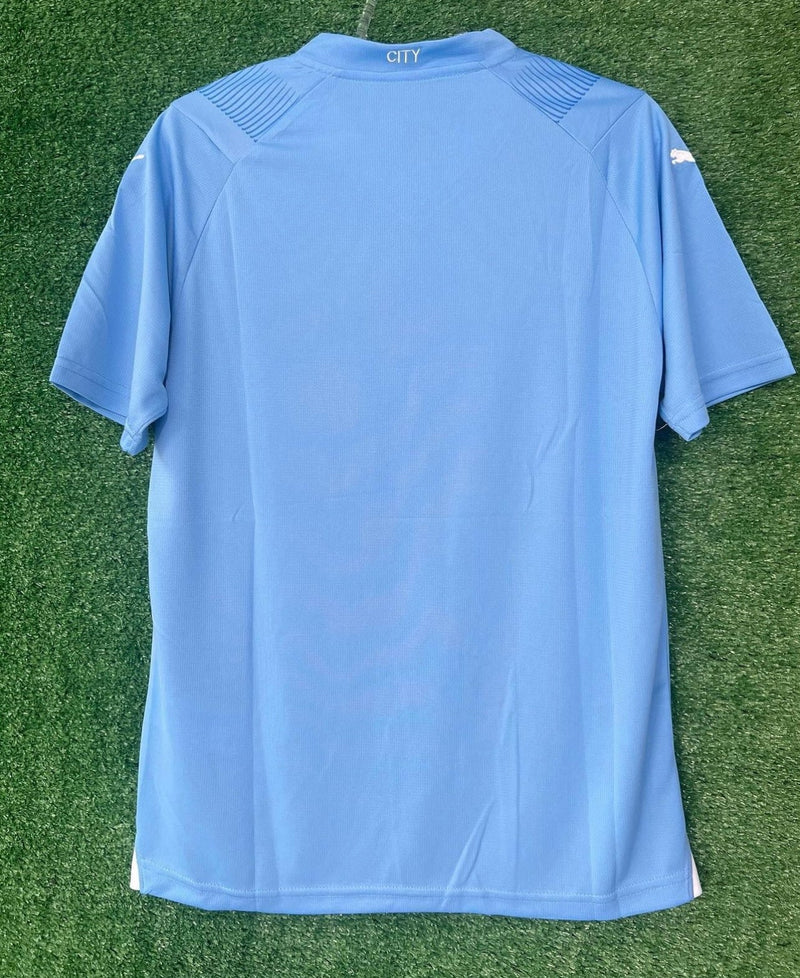 Camisola Manchester City I 23/24 - Azul e Branca